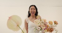 asian bride excited about wedding decor
