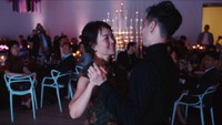 chinese groom dancing with his mom after first dance