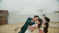 creative shot of wedding couple kissing