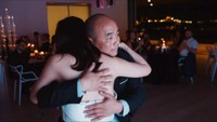 chinese bride hugging dad after first dance