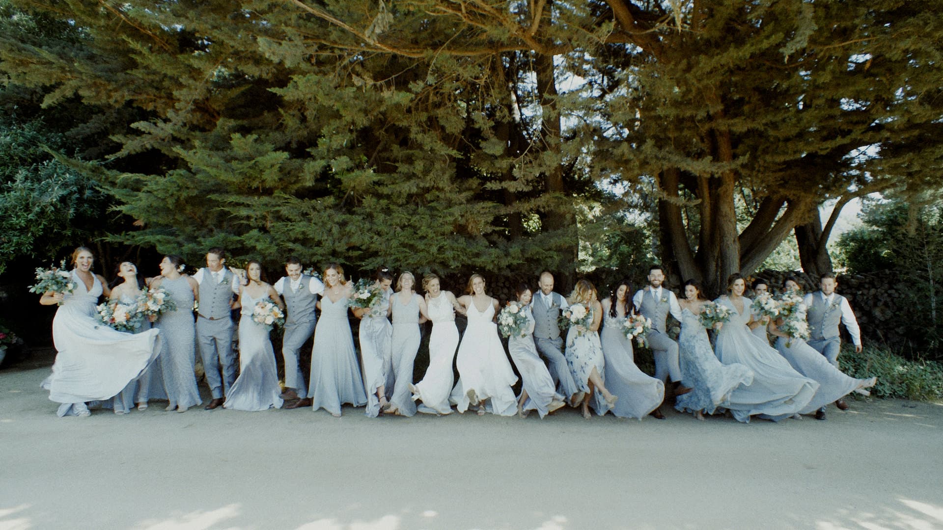 large wedding party dancing together