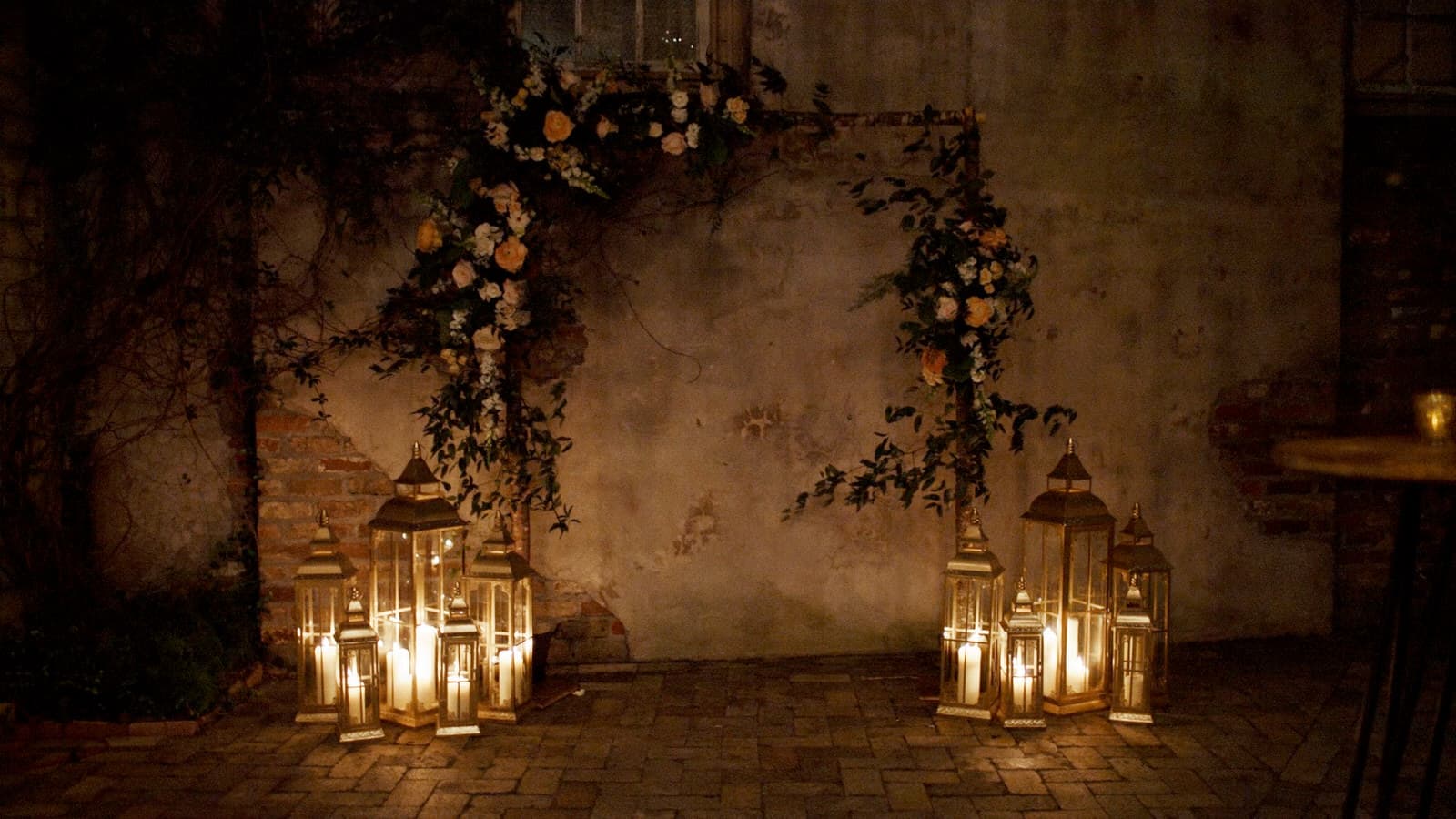 wedding arch with lanterns