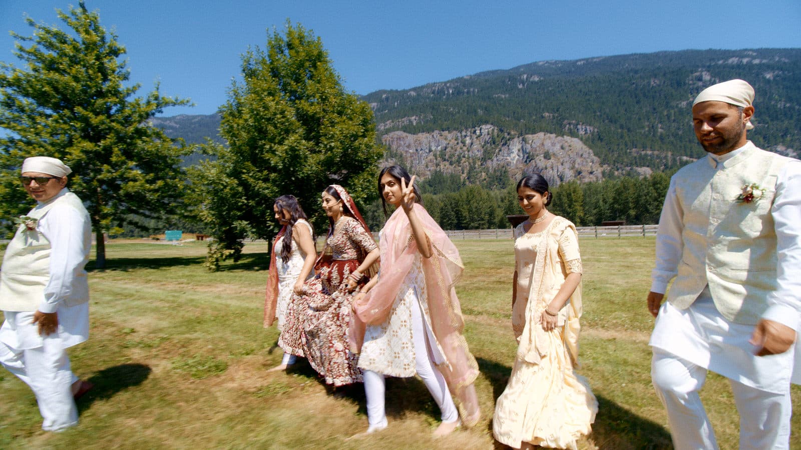 wedding party walking with indian bride at riverlands in pemberton